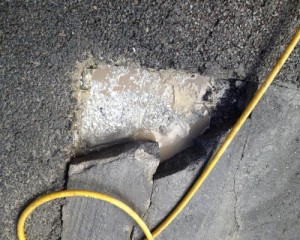 Riparazione di buchi nell’asfalto
