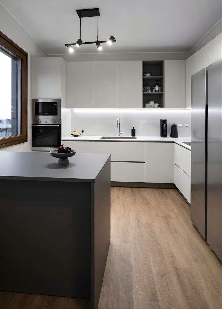 Dettaglio della cucina finita nel progetto di una villa milanese in cui si è utilizzato il materassino sottopavimento Isolmant LVT PLUS Dettaglio della cucina finita nel progetto di una villa milanese in cui si è utilizzato il materassino sottopavimento Isolmant LVT PLUS