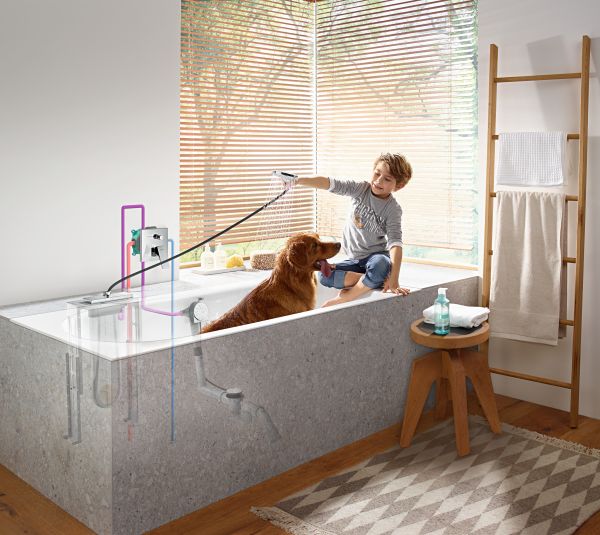 Sistema di avvolgimento tubo flessibile sBox di Hansgrohe per la vasca da bagno
